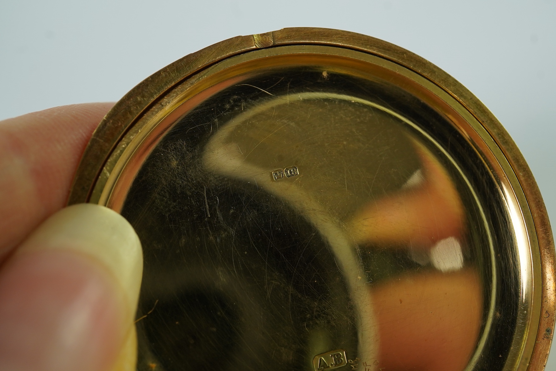 A late Victorian engine turned 18ct gold open faced keyless pocket watch by The American Waltham Watch Company